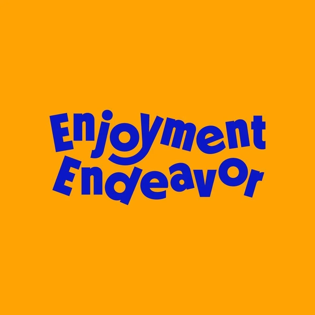 Text in bold blue letters on an orange background saying "Enjoyment Endeavor" with a playful, wavy font.