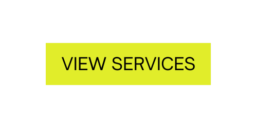 Bright yellow sign with black text that reads 'VIEW SERVICES'