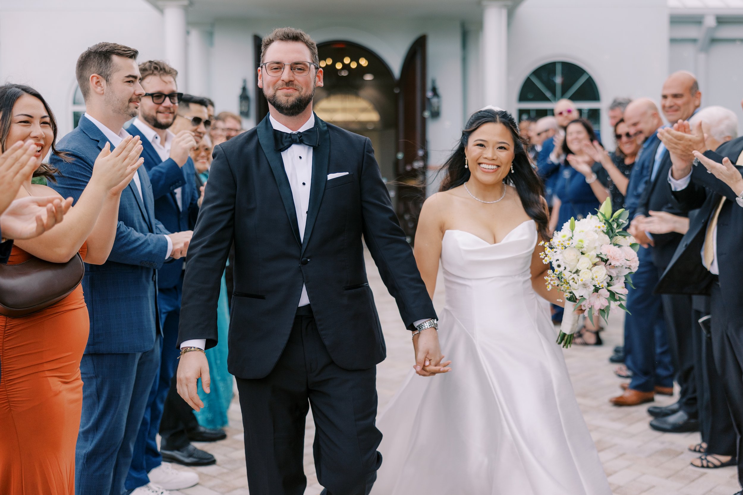 Bride and groom bubble exit at Harborside Chapel in Safety Harbor Florida