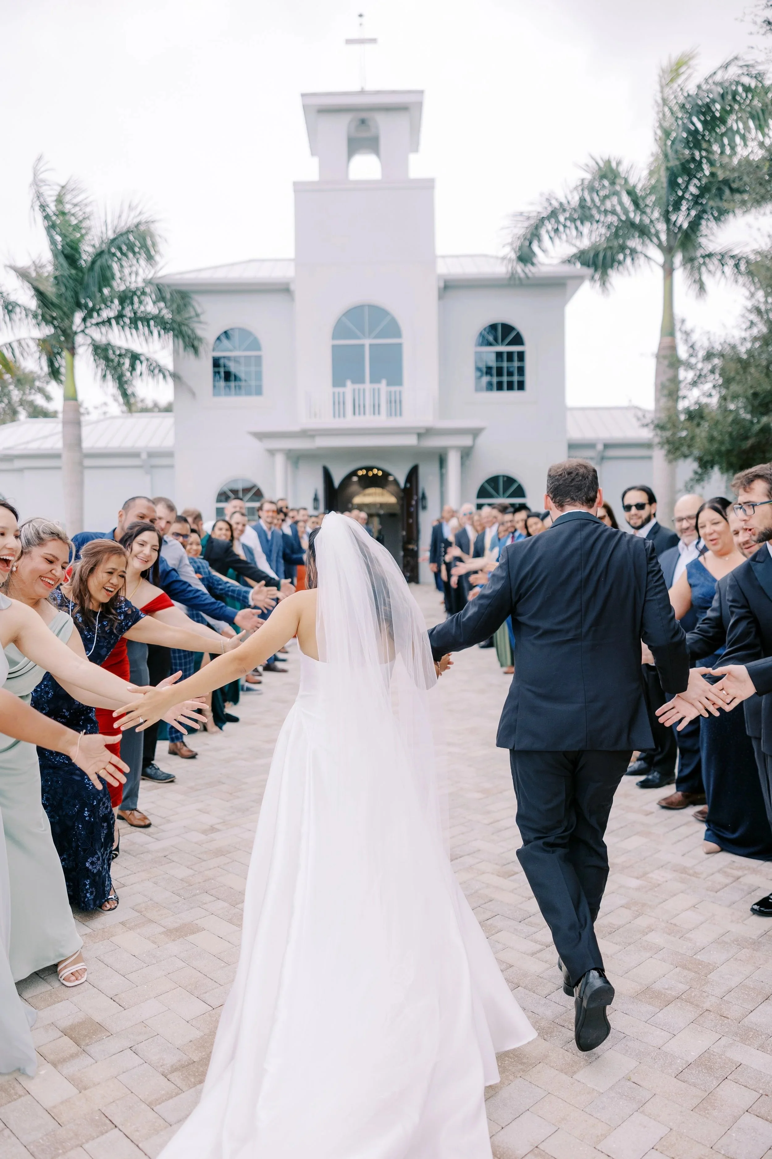 Bride and groom celebrate after ceremony at Chapel in Safety Harbor Florida