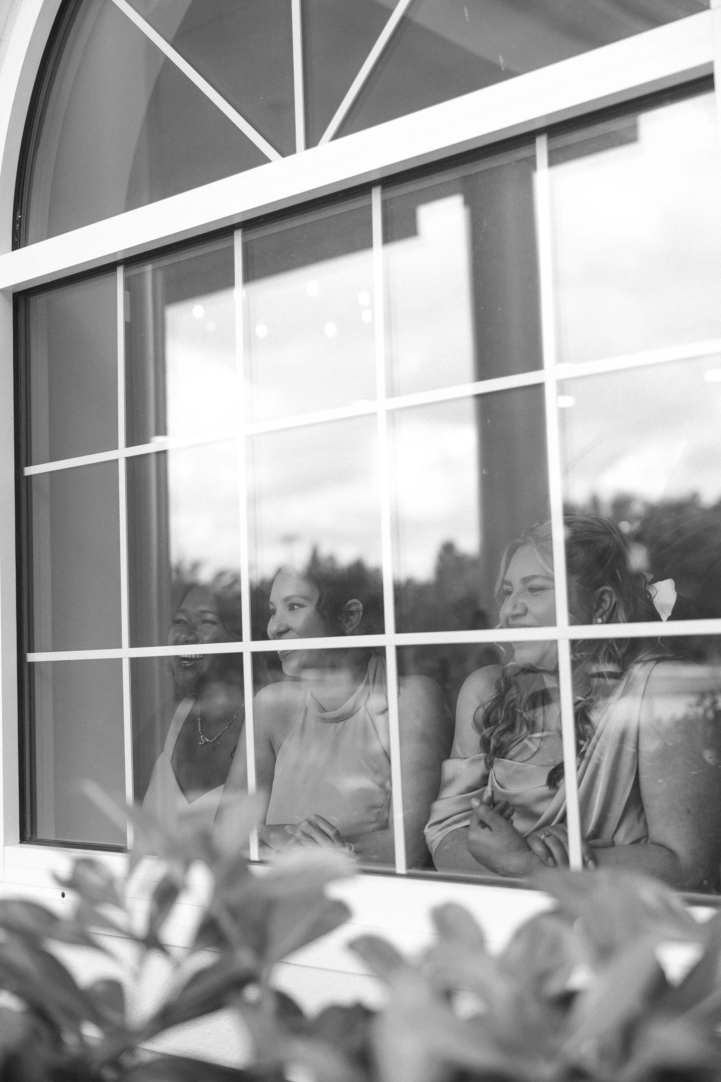 Bridesmaids watch first look Central Florida wedding photographer