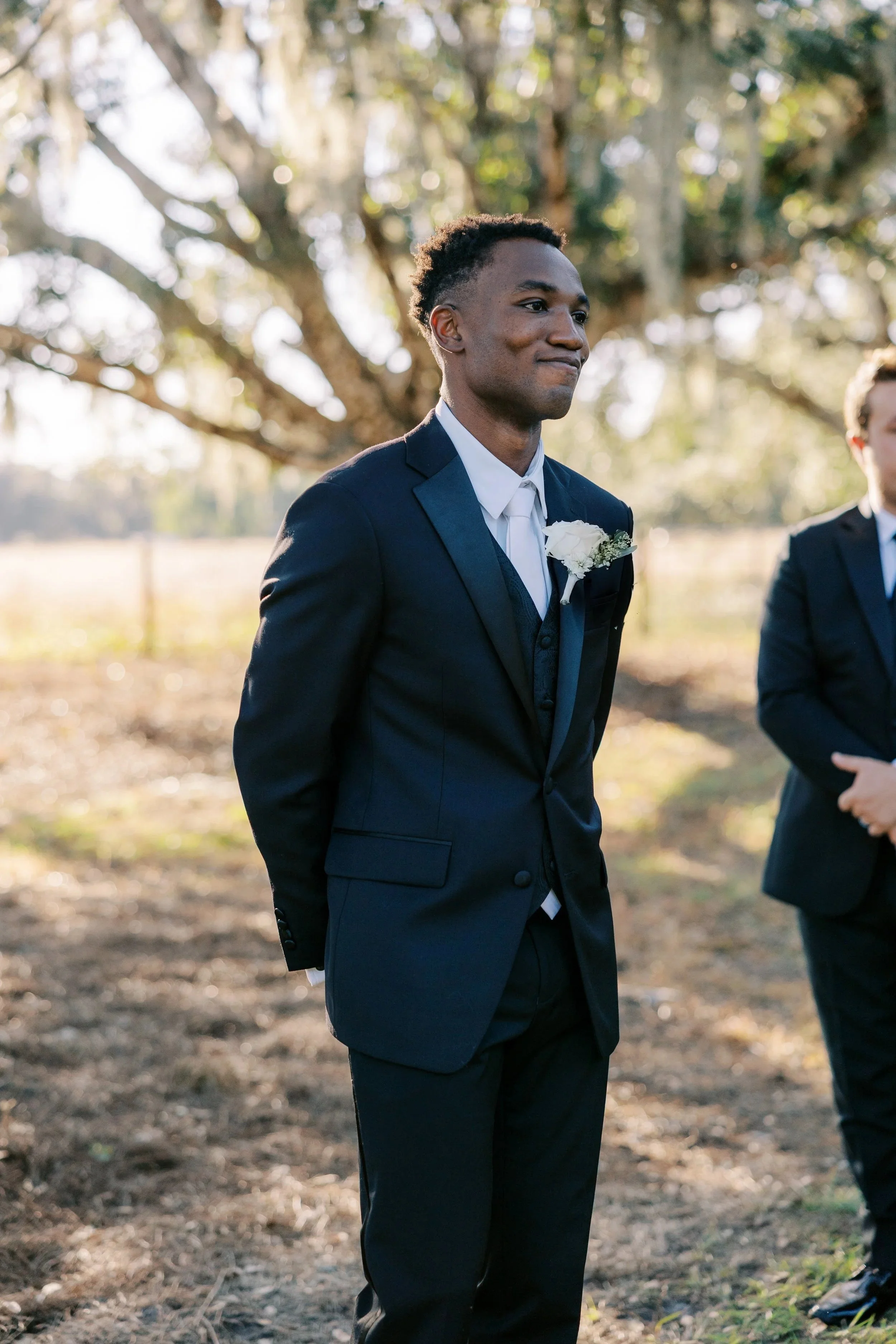 Groom's reaction to seeing bride walk down the aisle at Browns Grove
