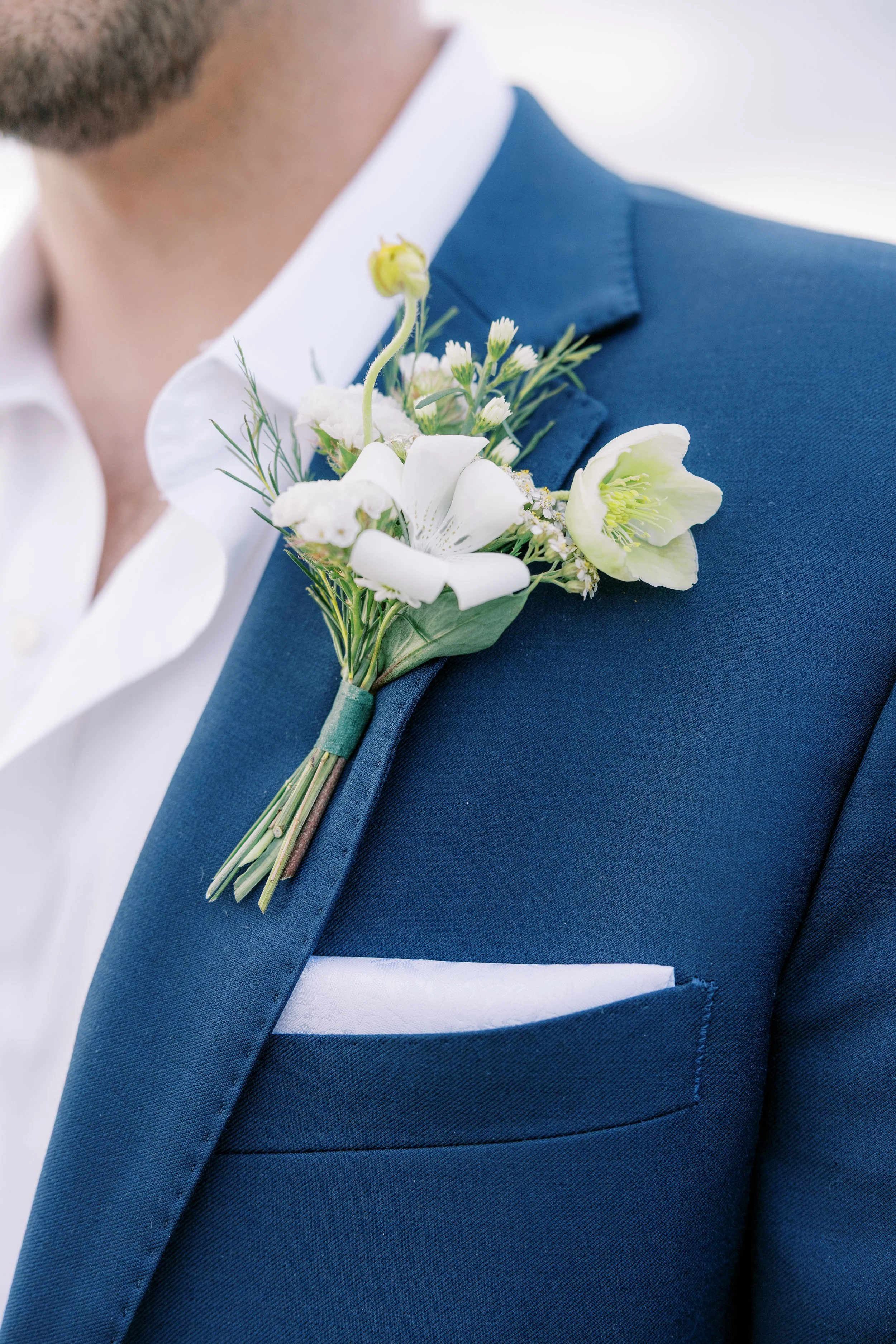 Groom-whimsical-boutonniere.jpg