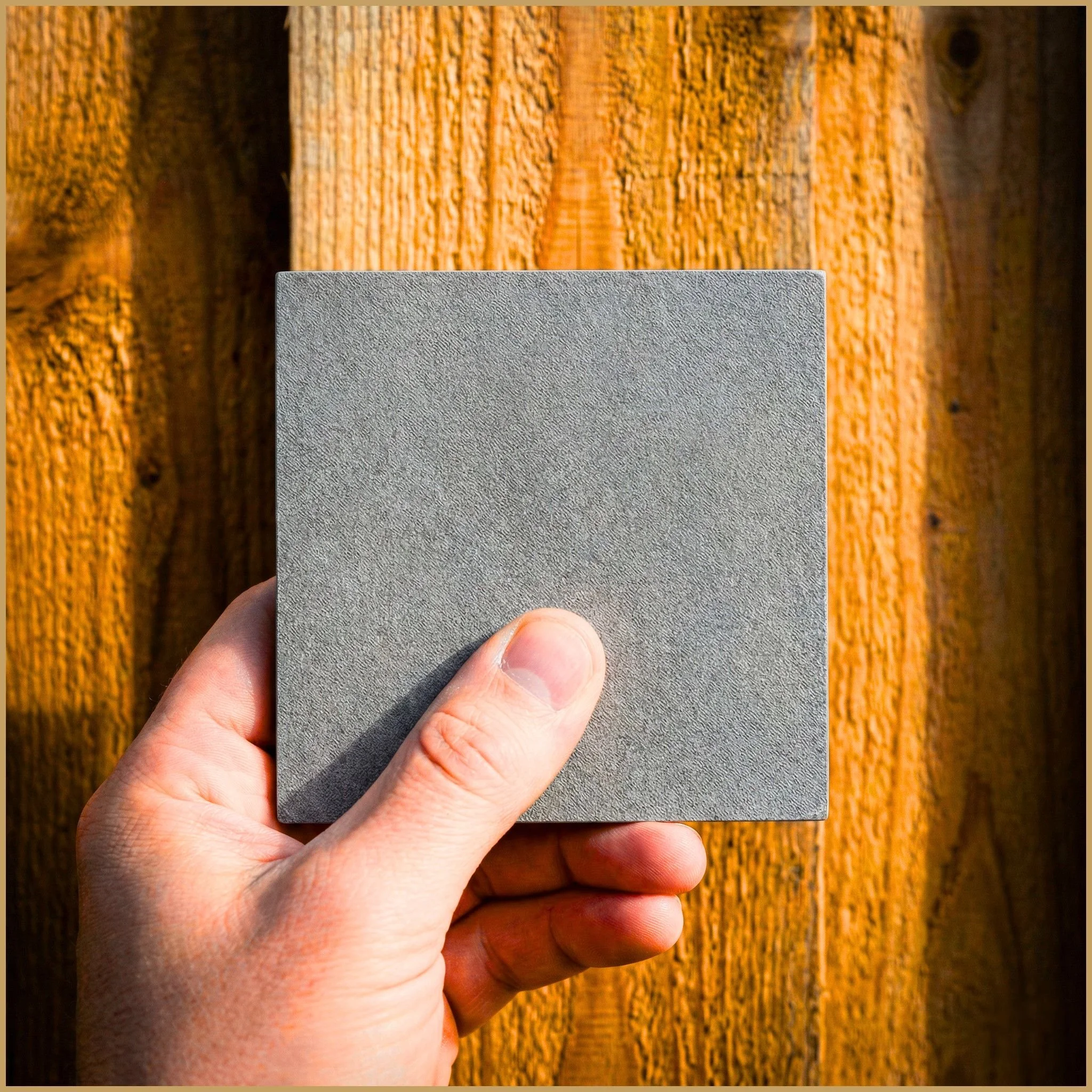 Moonlight Garden designer verifying natural stone and fencing material samples