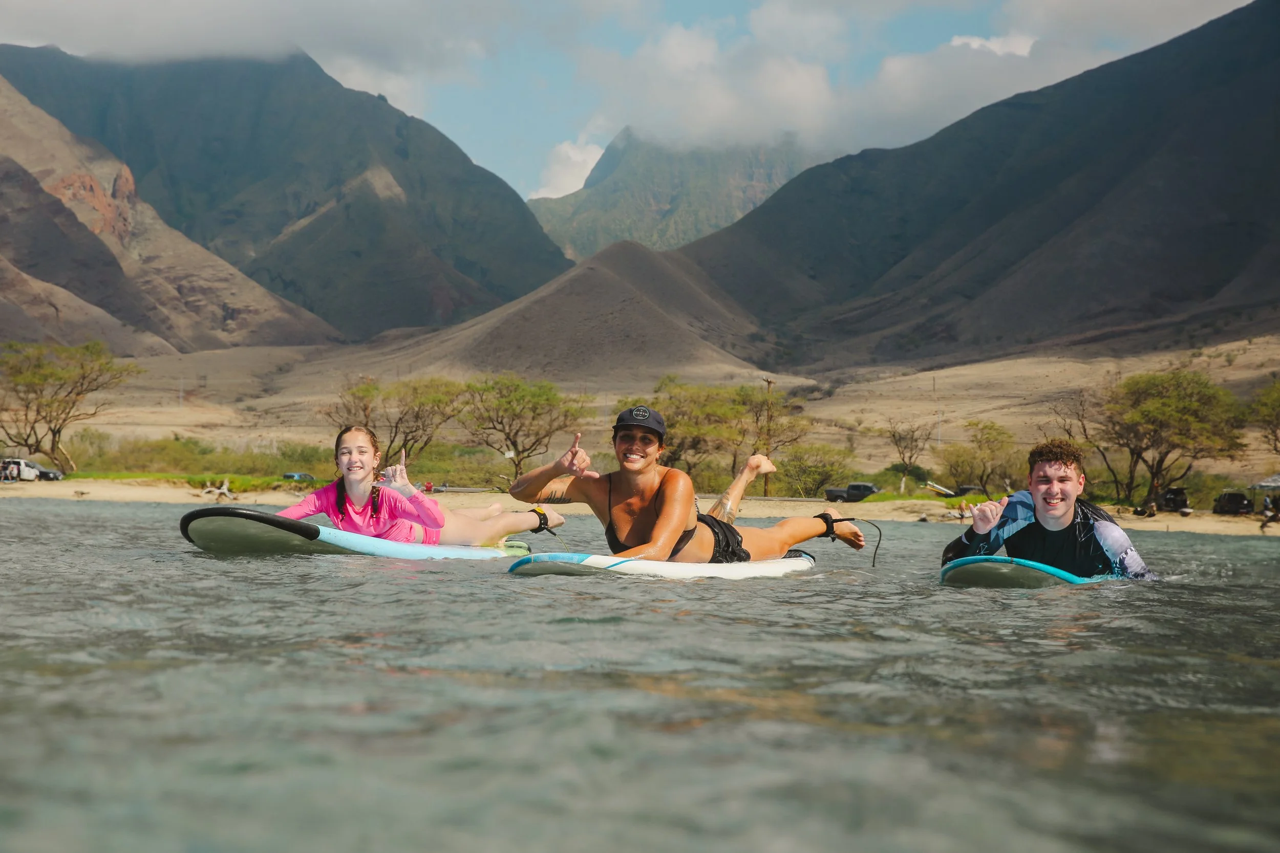 Beginner surfer learning to surf in Maui