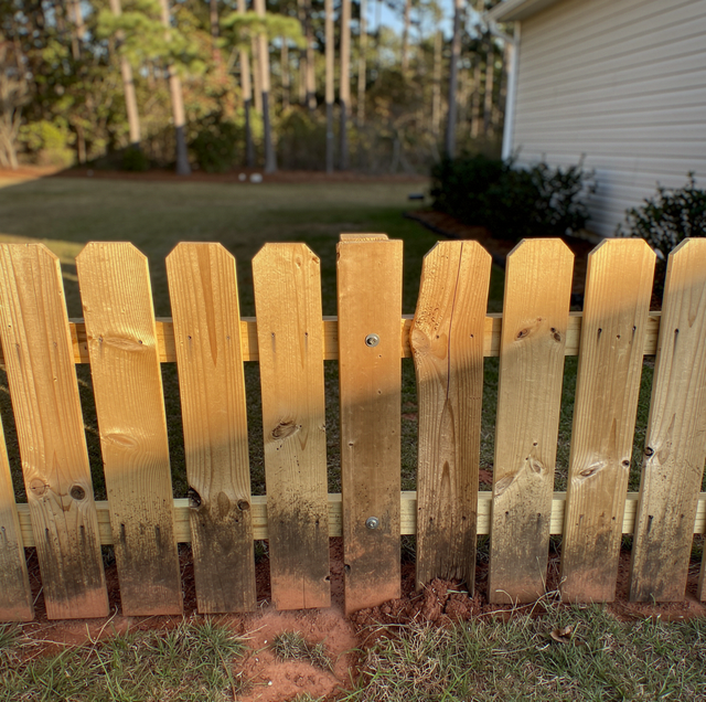 weathered cedar fence pickets swelling tight without gaps