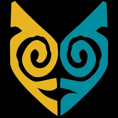 A stylized face with a split design, half yellow and half blue, with spiral eyes and a small mouth.