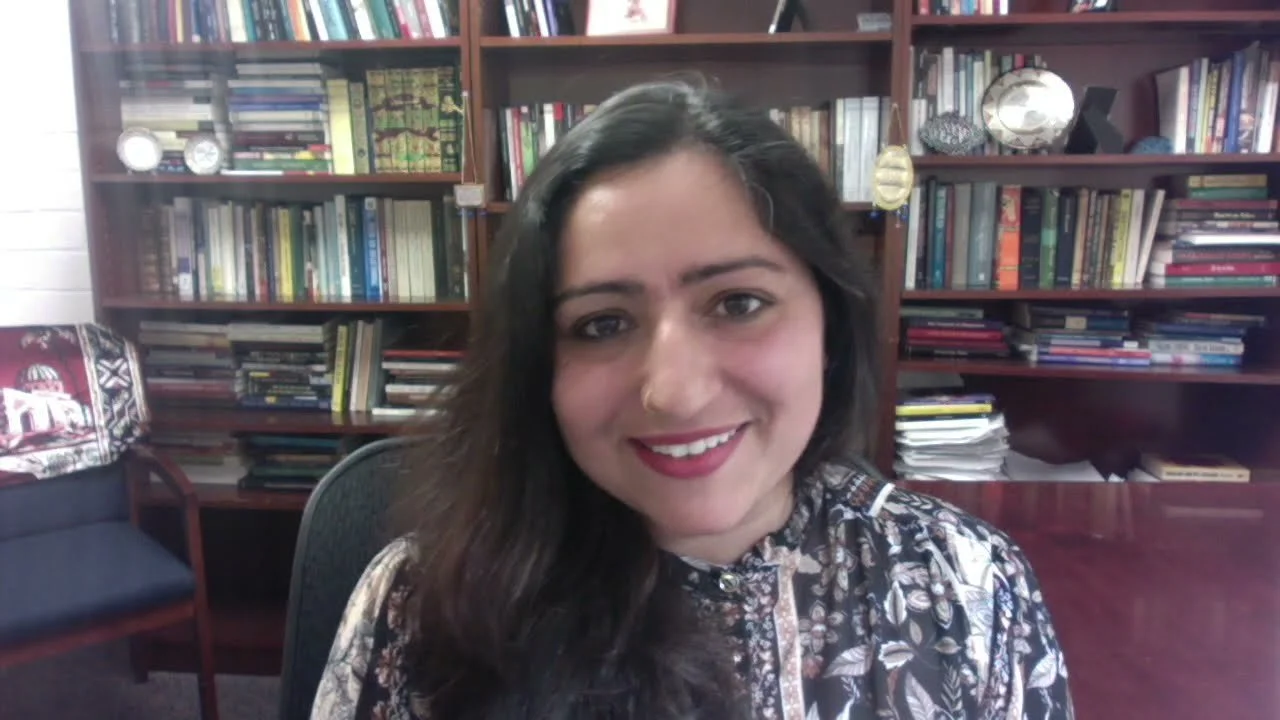 Thumbnail of "Homosexuality and Same-Sex Relations in Islam: Summary of Ch. 5 of "Sexual Ethics & Islam" | WTP?!" 

A woman with dark brown hair, wearing a patterned blouse, smiling at the camera in front of a bookshelf filled with books and decorati