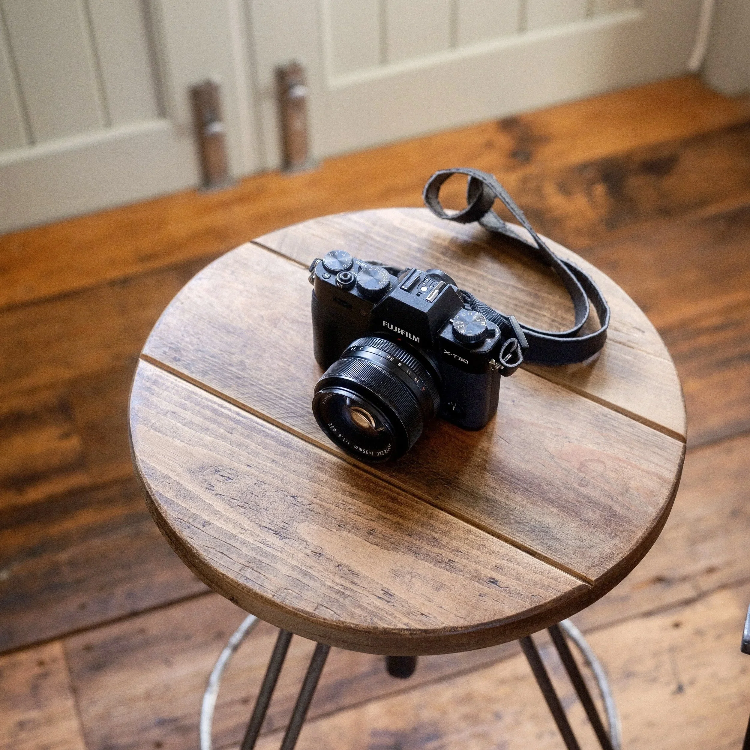Camera on table — creative retreat space inside Stargazey, near Watergate Bay.