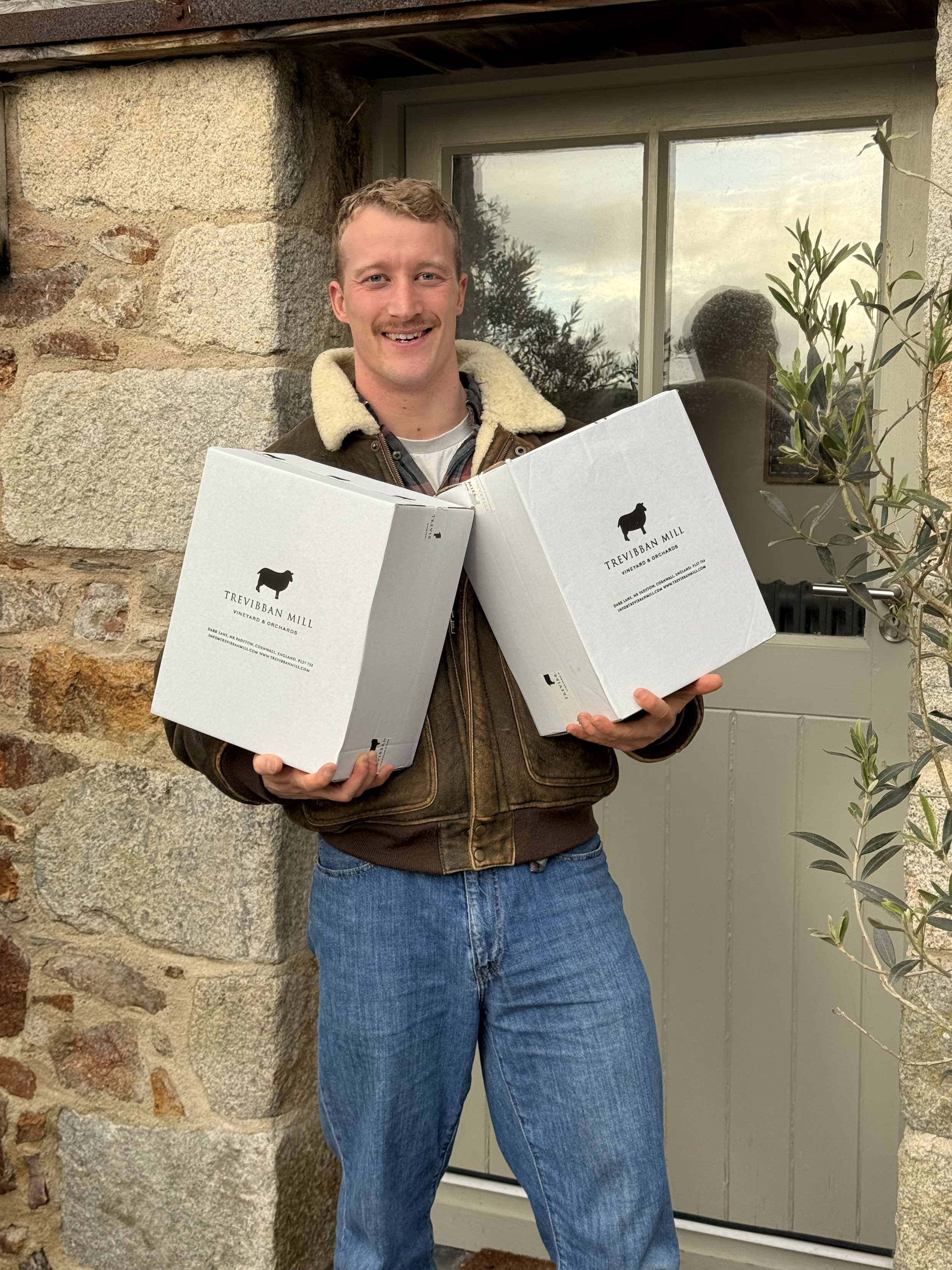 Trevibban Mill wine delivery outside Stargazey, showcasing local Cornish producers.