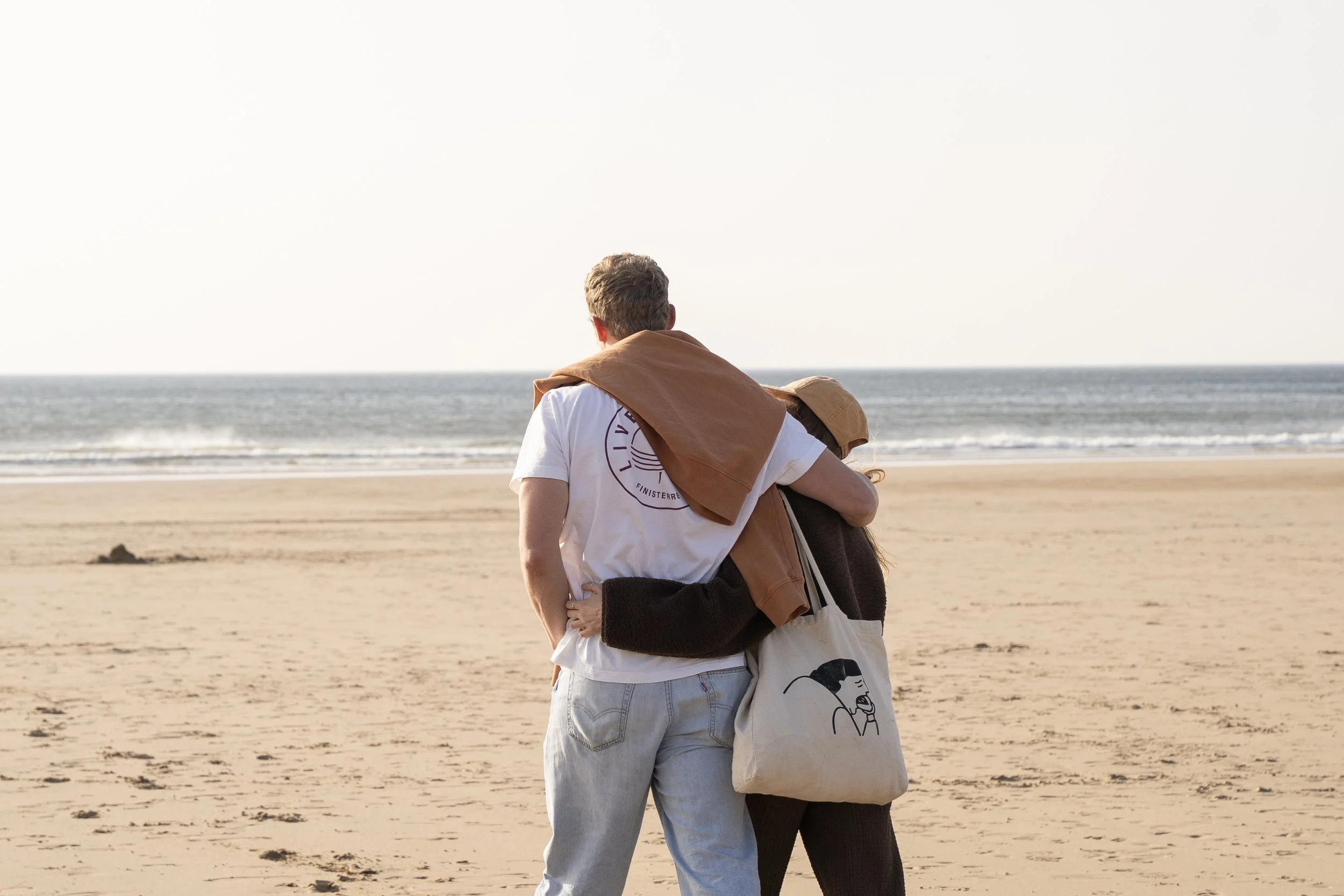 Couple on the beach near Stargazey, North Cornwall coast