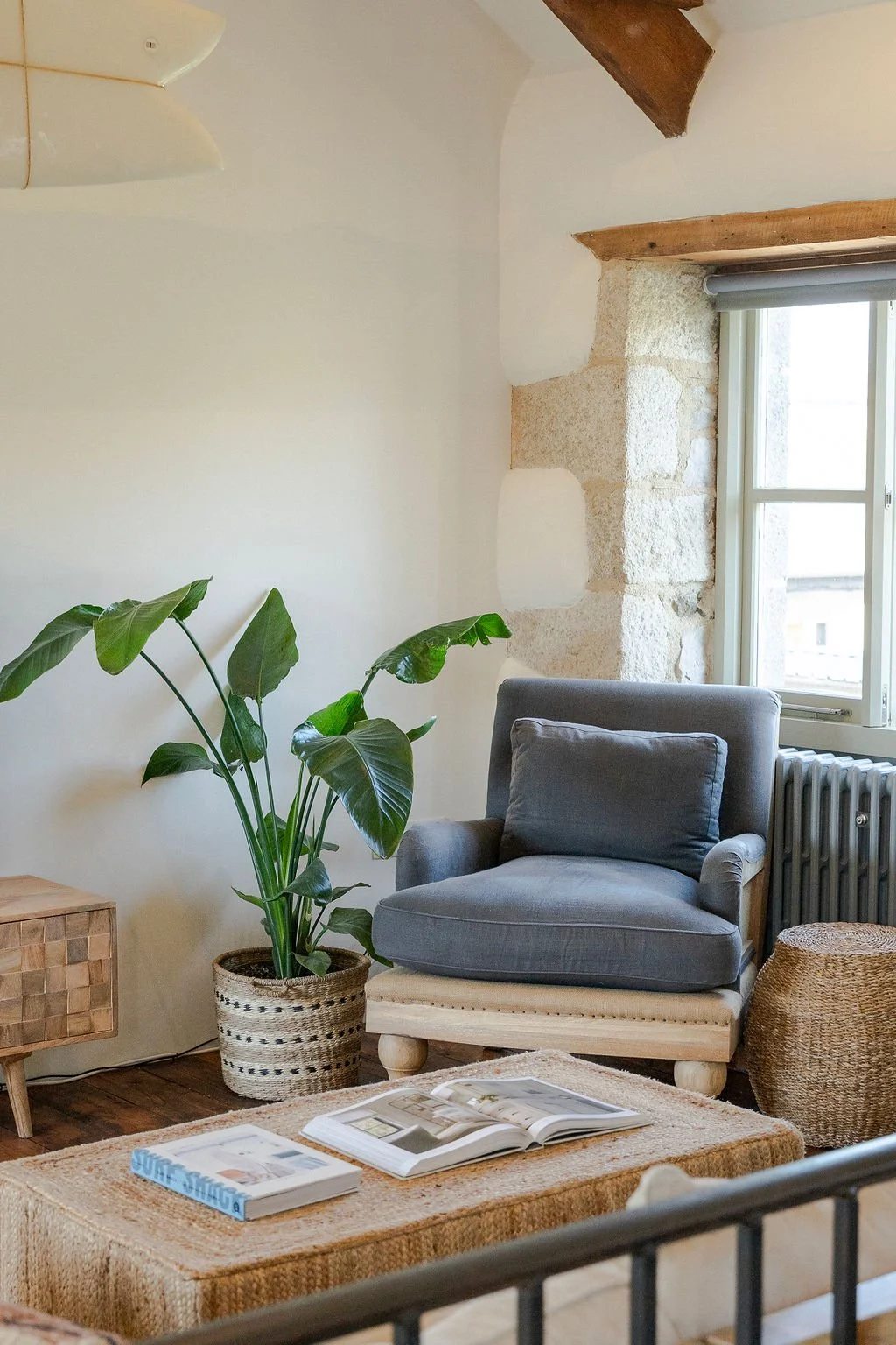 Reading corner inside Stargazey barn — soft furnishings and natural textures, Mawgan Porth
