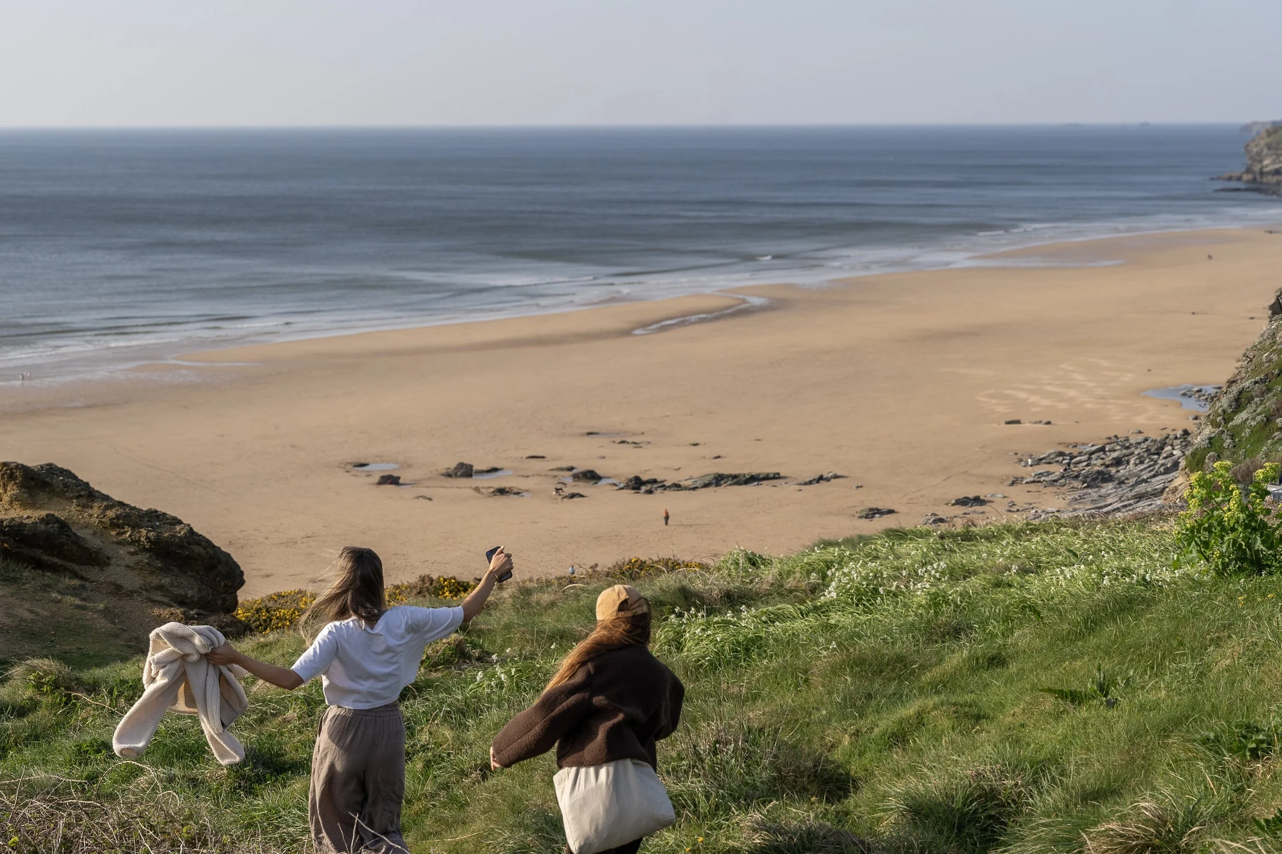 Guests walking toward the beach near Stargazey, Mawgan Porth, North Cornwall