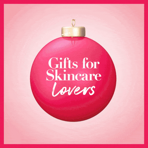 Pink Christmas ornament with white text that says "Gifts for Skincare Lovers" on a pink background.