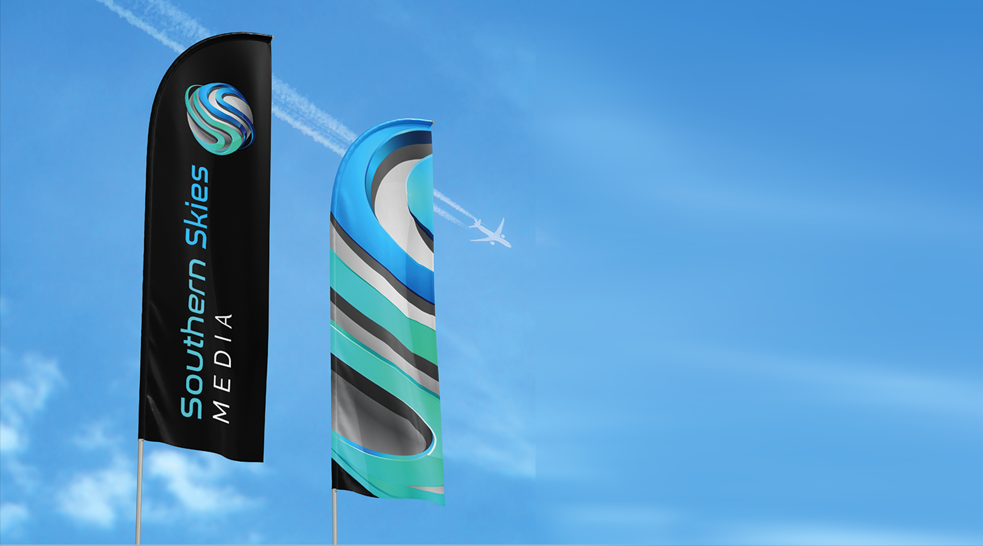 Two colorful vertical flags with the South Aer Skies logo flying in a clear blue sky, with an airplane leaving contrails in the background.
