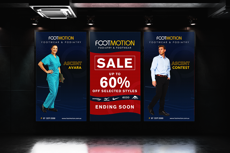 Three advertisement posters for Foot Motion Footwear & Podiatry, promoting a sale of up to 60% off on selected styles, with an 'Ending Soon' notice. The posters feature a woman in medical scrubs on the left and a man in business attire on the right, set against a dark background in an indoor space.