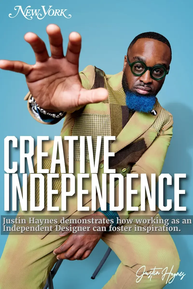 JUS10H 2025 New York Magazine feature, Creative Independence editorial cover, olive patchwork suit, bold reaching pose, teal background, photographed by Scott Parker Photo