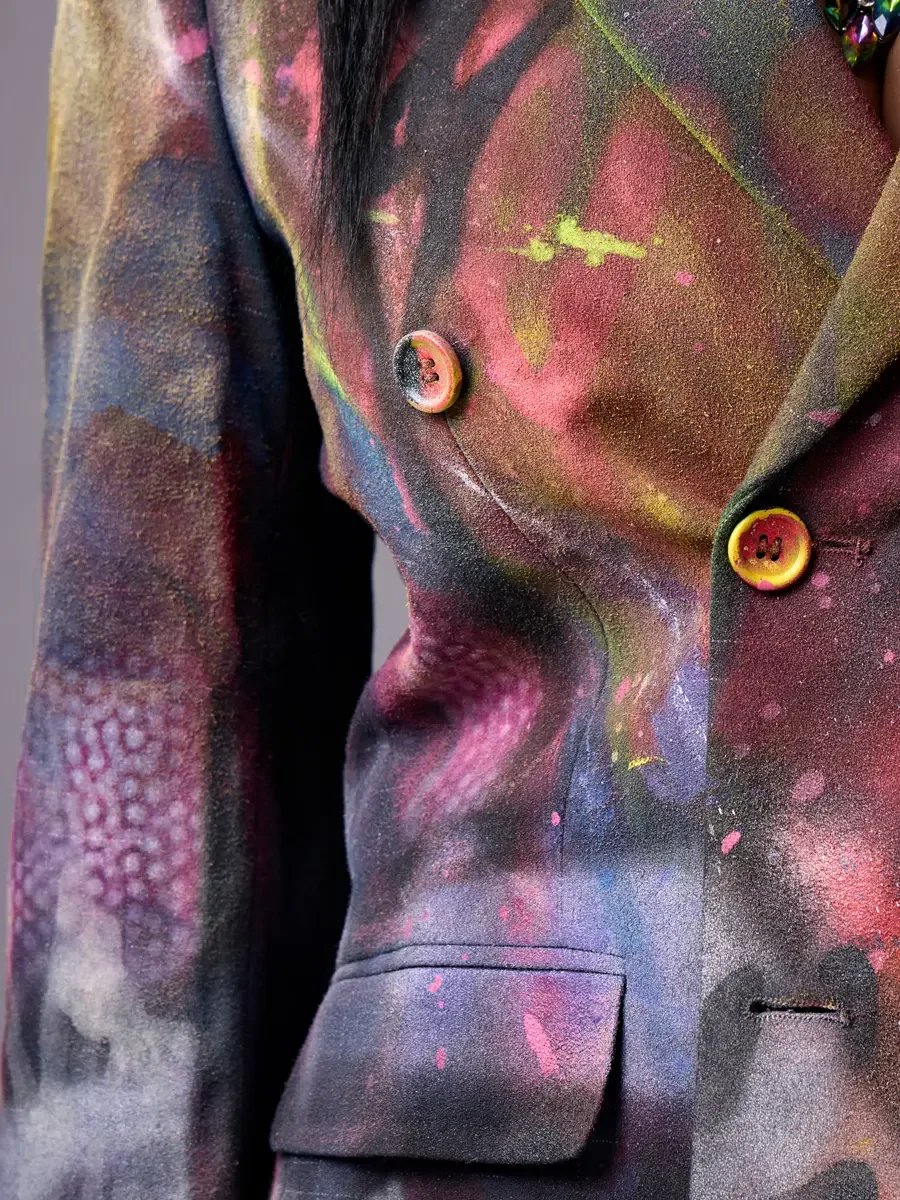 JUS10H Met Monday 2026, blazer detail, hand-painted fabric with amber buttons, grey background, photographed by Scott Parker Photo