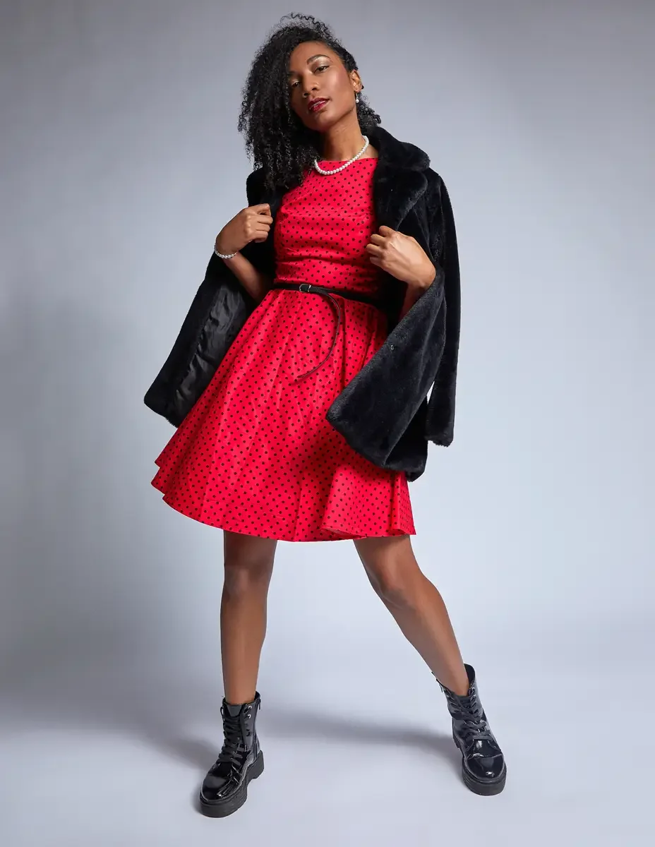 Arielle Chambers, red polka dot fit-and-flare dress, black faux fur coat, pearl necklace, platform boots, East Williamsburg studio test shoot, makeup by Schanica Pickens, photographed by Scott Parker Photo