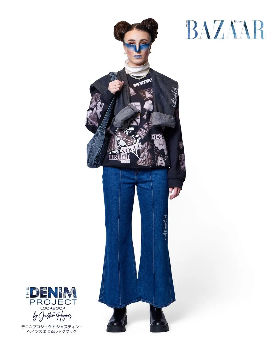 JUS10H Denim Project 2025 Harper's Bazaar Japan lookbook — model in fashion magazine collage sweatshirt printed with Vogue and JUS10H imagery, draped with a dark denim vest, carrying a dark wash denim shoulder bag, paired with dark indigo wide-leg fl