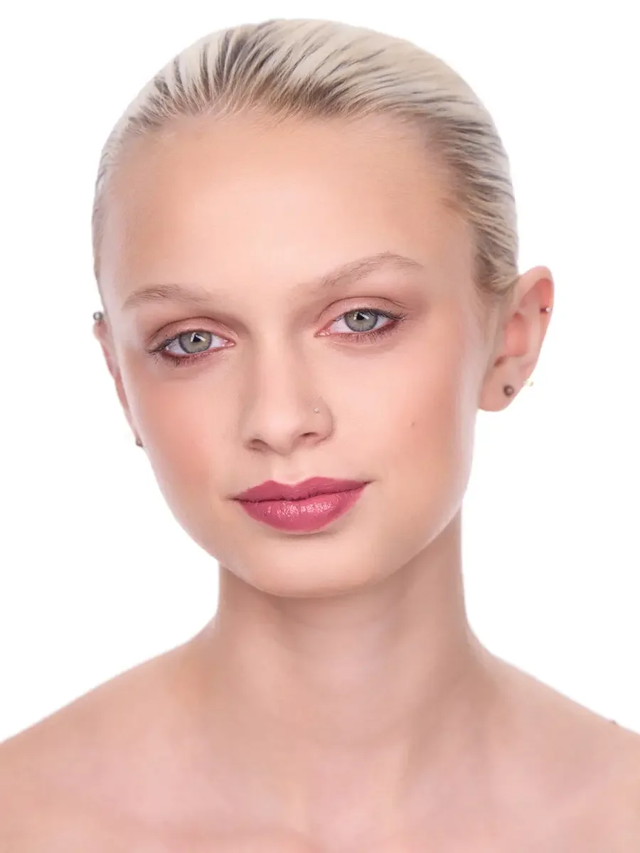 Model portfolio development session, beauty, close-crop, hair slicked back, slight turn, direct gaze, rose lip, soft eye, bare shoulders, white background, photographed by Scott Parker Photo, New York