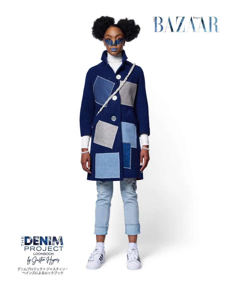 JUS10H Denim Project 2025 Harper's Bazaar Japan lookbook — model in deep navy patchwork wool-blend coat with large geometric denim appliqué panels in light and medium wash over light-wash cuffed straight jeans, pearl rope crossbody, white turtleneck,