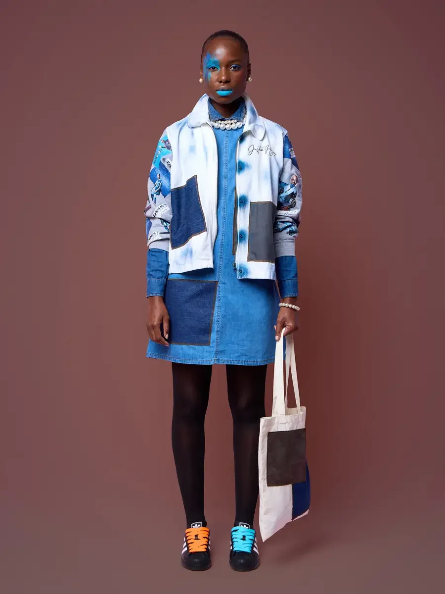 Lookbook sweatshirt with cover prints on the sleeve, tote raised, JUS10H Court Show, photographed by Scott Parker Photo