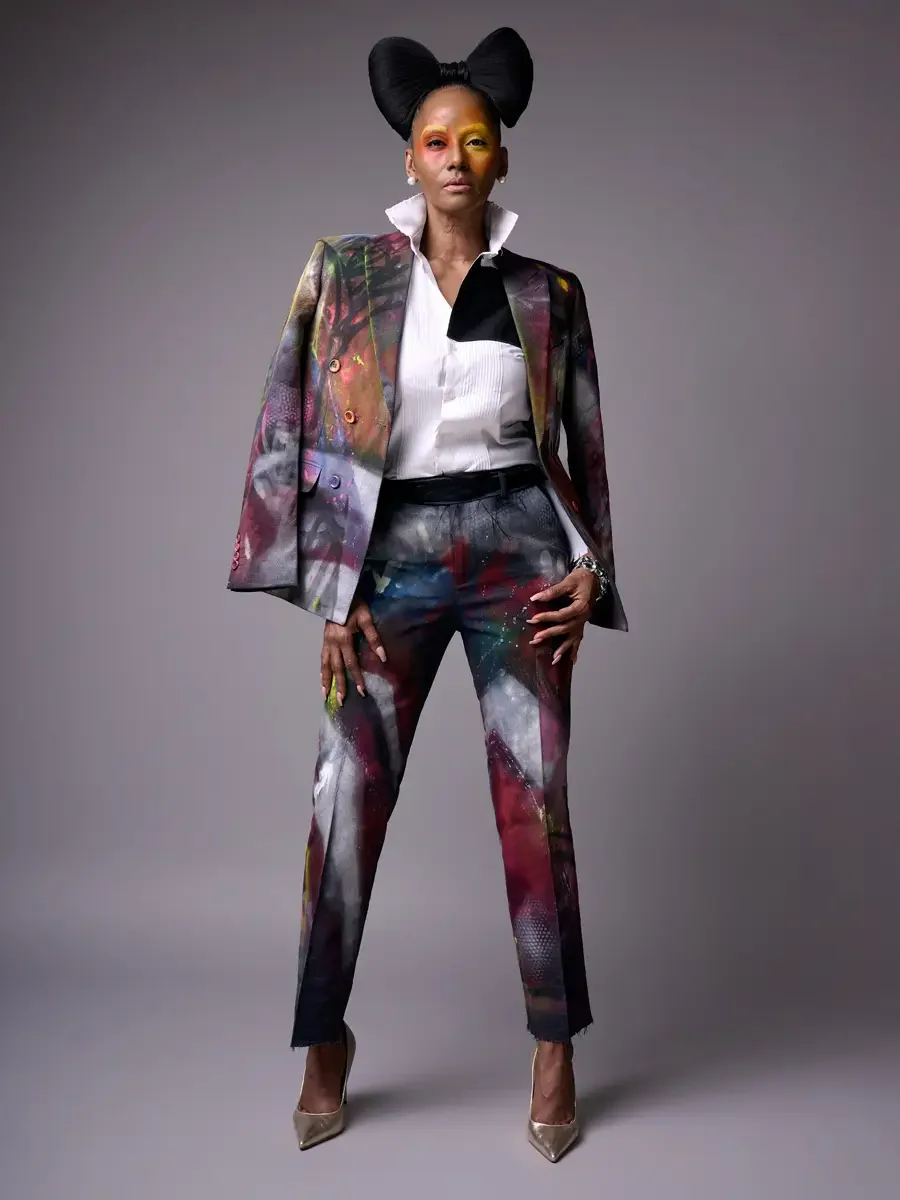 JUS10H Met Monday 2026, full-length hand-painted suit open with white tuxedo shirt, front facing, grey background, photographed by Scott Parker Photo