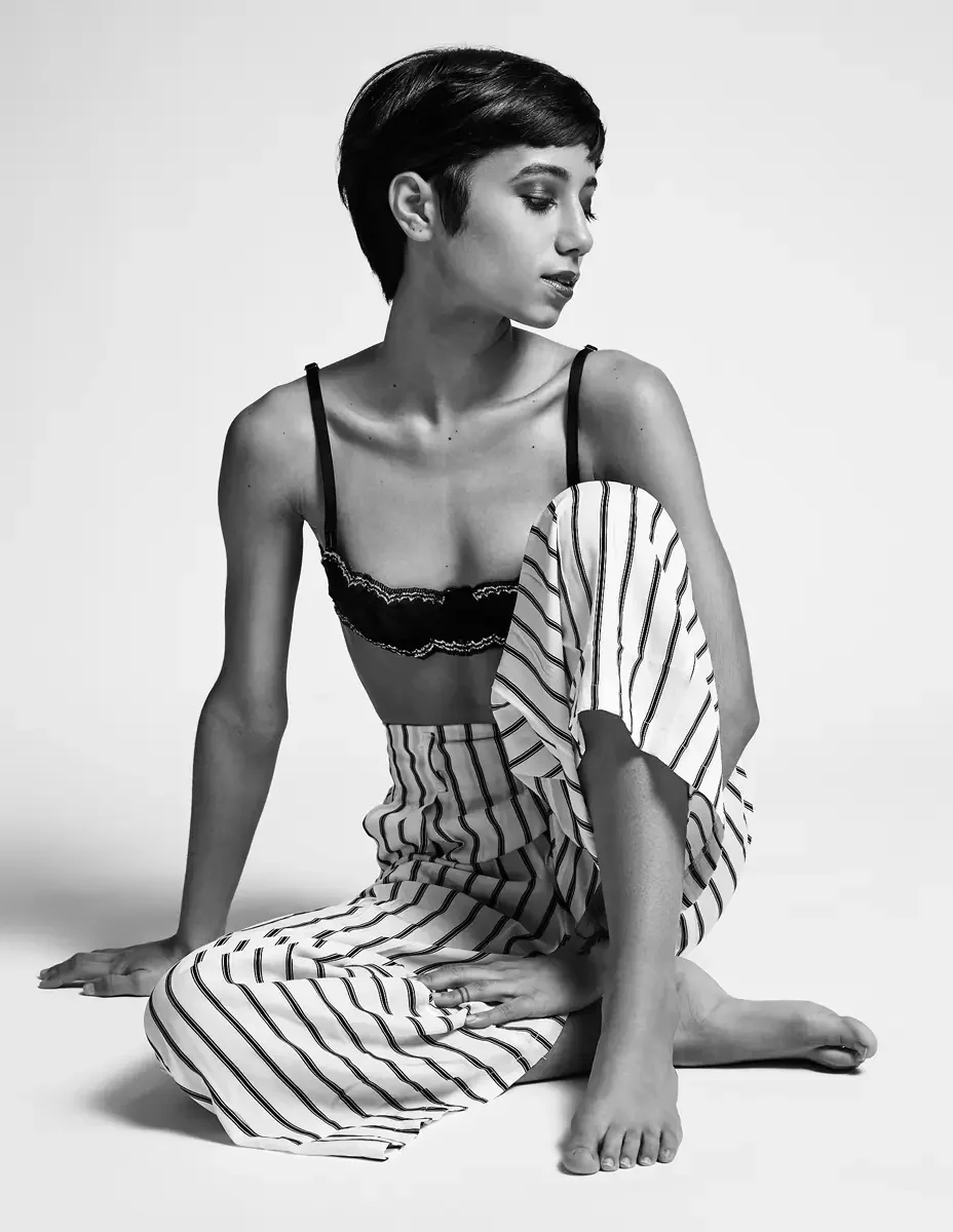Eloissa, black and white, floor-seated, black lace bralette and wide-leg striped trousers, gaze off frame, East Williamsburg studio test shoot, makeup by Schanica Pickens, photographed by Scott Parker Photo
