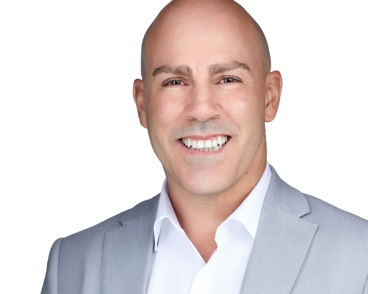 Medical professional portrait, light gray blazer and white shirt, open smile, white background, Hartford Connecticut, photographed by Scott Parker Photo