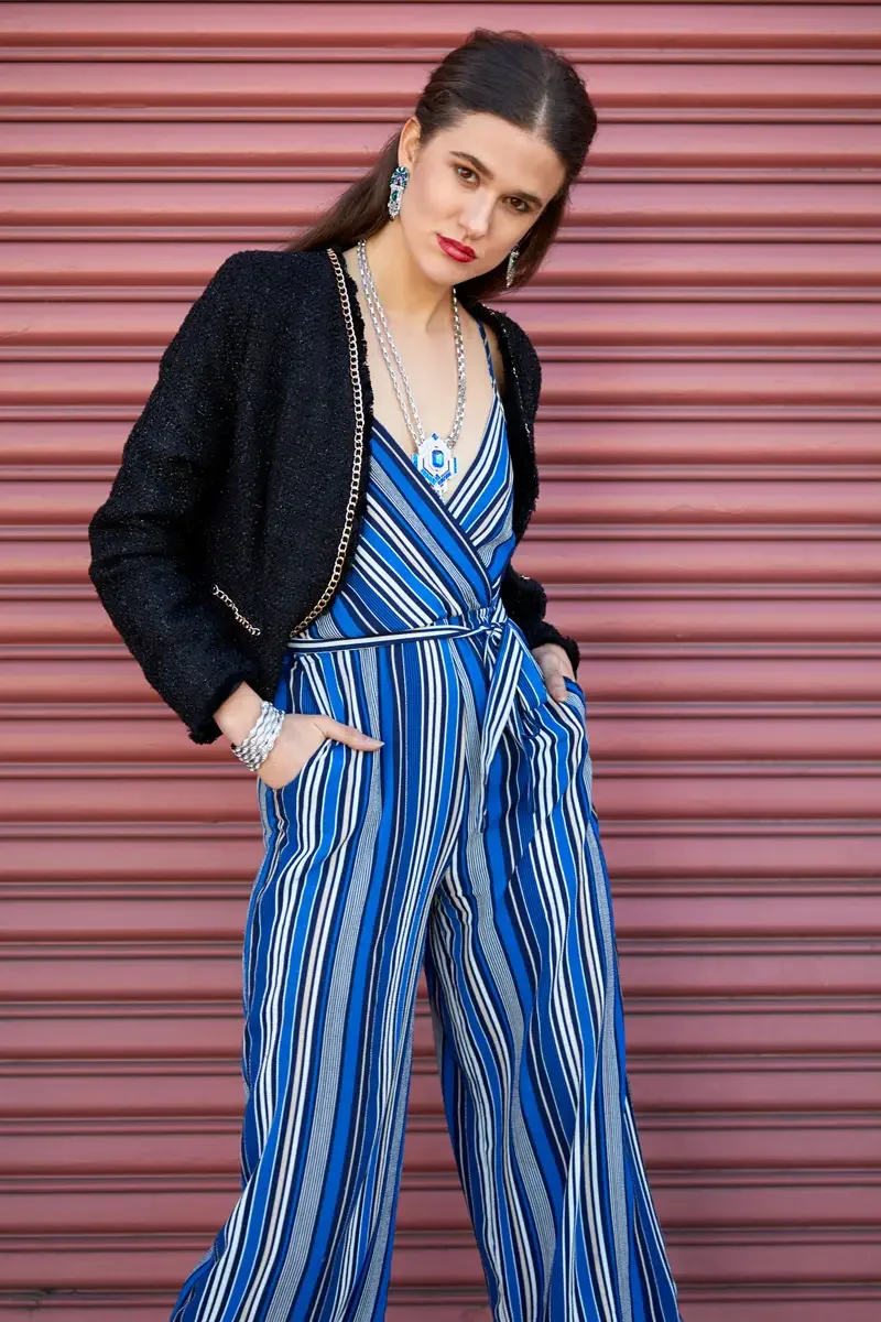 Victoria Henley, three-quarter length, blue striped jumpsuit and black tweed jacket, layered silver necklaces, pink corrugated metal door, Los Angeles fashion week test shoot, photographed by Scott Parker Photo