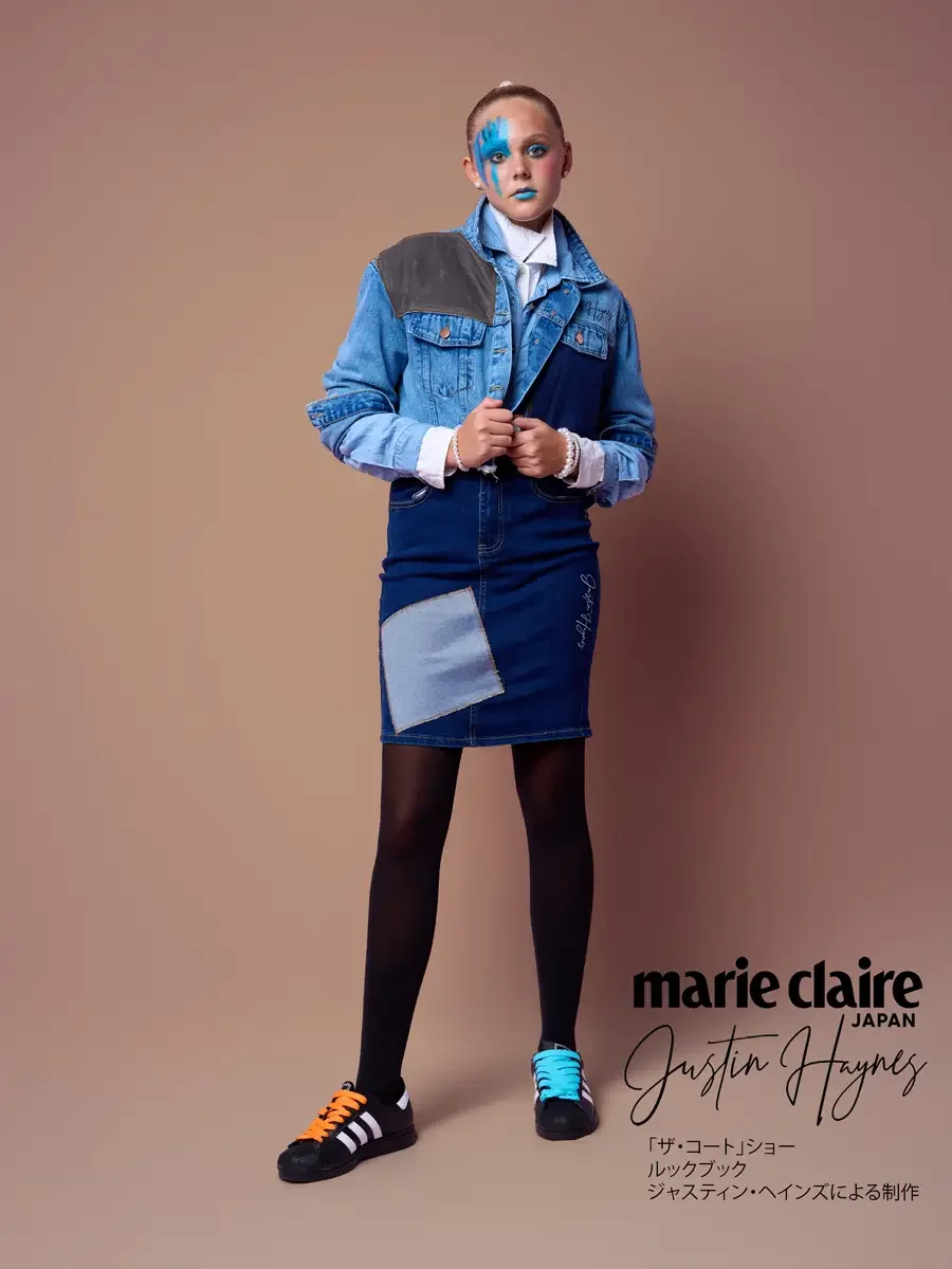 Cropped denim jacket and skirt set, pulling the jacket closed, JUS10H Court Show lookbook, photographed by Scott Parker Photo