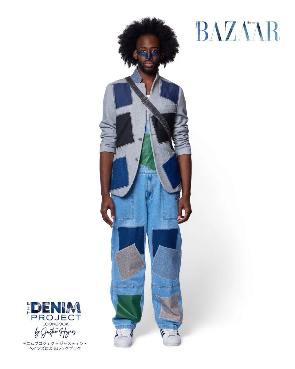 JUS10H Denim Project 2025 Harper's Bazaar Japan lookbook — male model in grey patchwork blazer-style vest with large navy, charcoal, and denim geometric panels over green t-shirt with dark denim crossbody bag, paired with light-wash wide-leg jeans fe