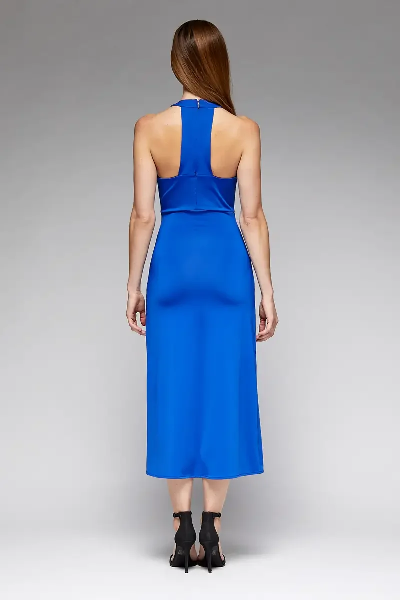 Minika Ko lookbook, cobalt blue halter midi dress, back view, open racerback with center back zip, horizontal seam at waist, smooth synthetic skirt, photographed by Scott Parker Photo