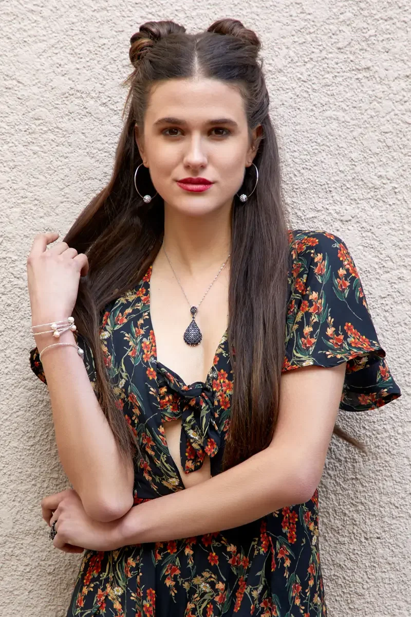 Victoria Henley, black floral maxi dress with skirt split, stucco wall, Los Angeles fashion week test shoot, photographed by Scott Parker Photo