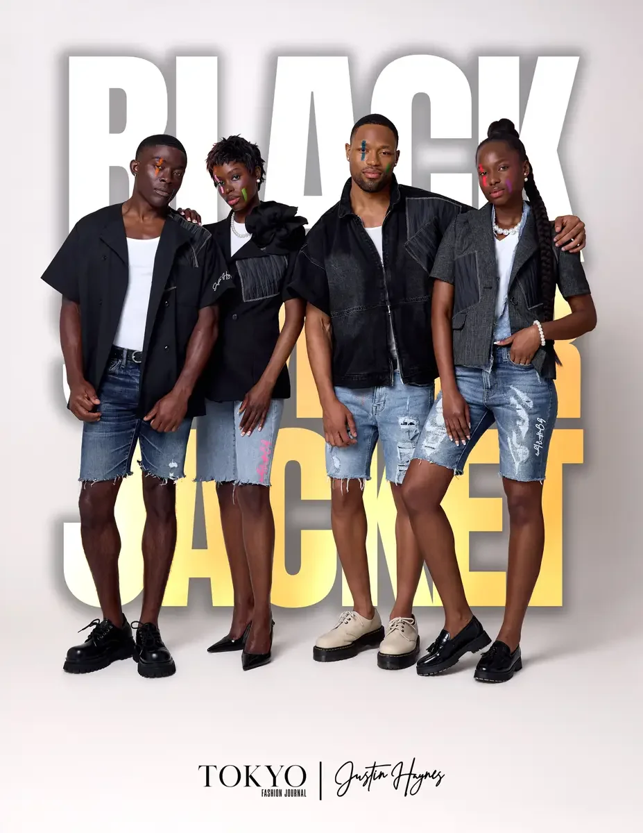 JUS10H Black Summer Jacket lookbook, four models in black patchwork jackets and distressed denim shorts, arms around each other, white background, photographed by Scott Parker Photo