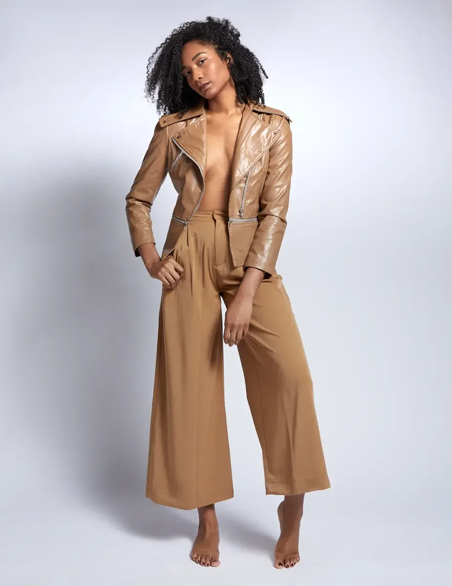 Arielle Chambers, profile, camel wide-leg trousers and patent leather moto jacket, East Williamsburg studio test shoot, makeup by Schanica Pickens, photographed by Scott Parker Photo