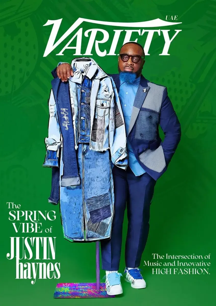 JUS10H 2025 Variety UAE feature, The Spring Vibe editorial, designer with illustrated mannequin in denim patchwork coat, navy patchwork suit, green background, photographed by Scott Parker Photo