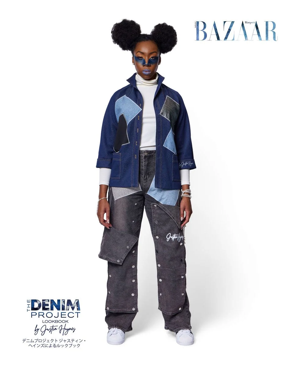 JUS10H Denim Project 2025 Harper's Bazaar Japan lookbook — model in dark indigo zip-front denim work jacket with large geometric light-wash, charcoal, and leather patchwork panels over white turtleneck, paired with dark wash wide-leg snap-side jeans 