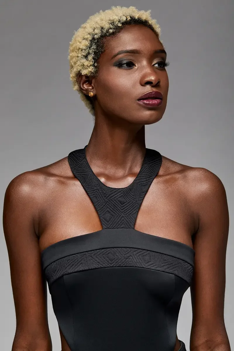 Minika Ko lookbook, detail, jacquard halter strap and bandeau neckline of black halter gown, diamond geometric pattern, photographed by Scott Parker Photo