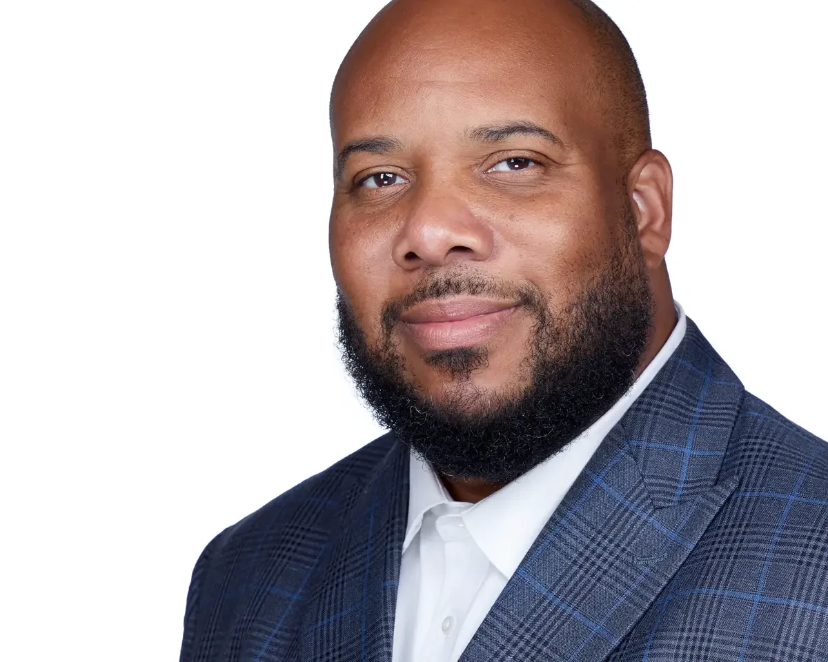 Executive headshot, plaid blazer and white shirt, white background, Greater Hartford Connecticut, photographed by Scott Parker Photo