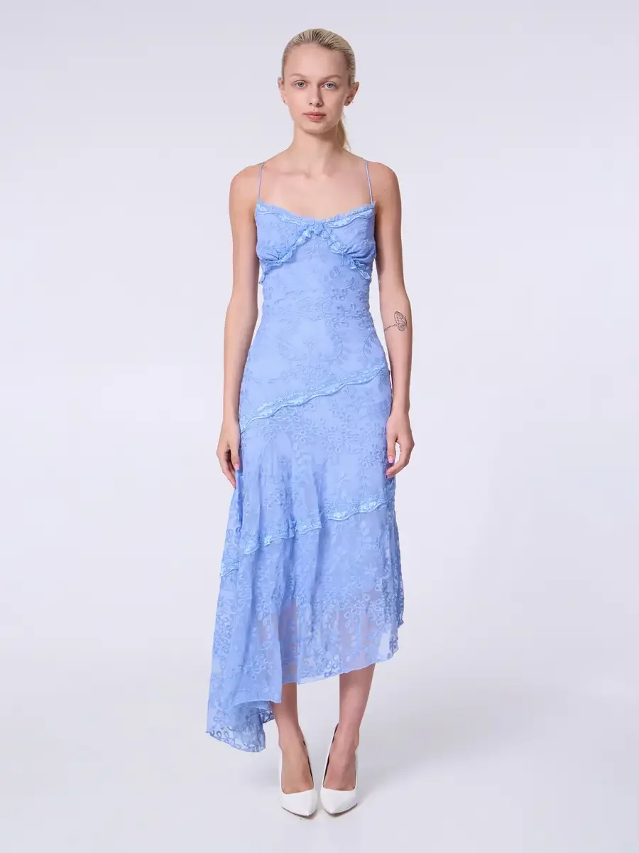 Model portfolio development session, commercial look, periwinkle blue lace asymmetrical midi dress with ruffle bodice detail and spaghetti straps, full-length, facing camera, arms relaxed at sides, direct gaze, tiered asymmetrical hem and full dress 