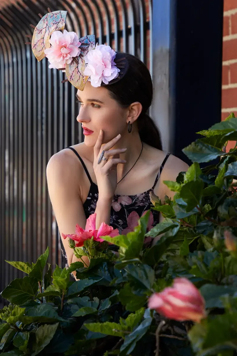 Victoria Henley, fan fascinator headpiece, silver jewelry detail, hibiscus flowers, iron gate, Los Angeles fashion week test shoot, photographed by Scott Parker Photo