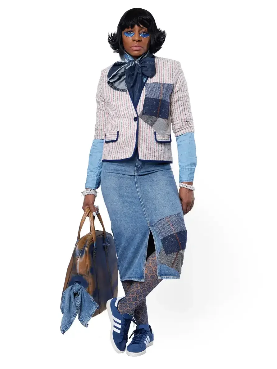 Fashion lookbook photography, striped tweed blazer with patchwork denim skirt and Adidas sneakers, white background, photographed by Scott Parker Photo