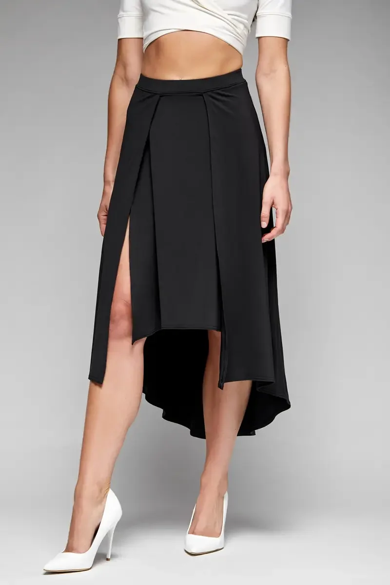 Minika Ko lookbook, detail, black asymmetric midi skirt, front view showing pleated panel at hip, high-low hem construction, and front slits, smooth synthetic fabric, photographed by Scott Parker Photo