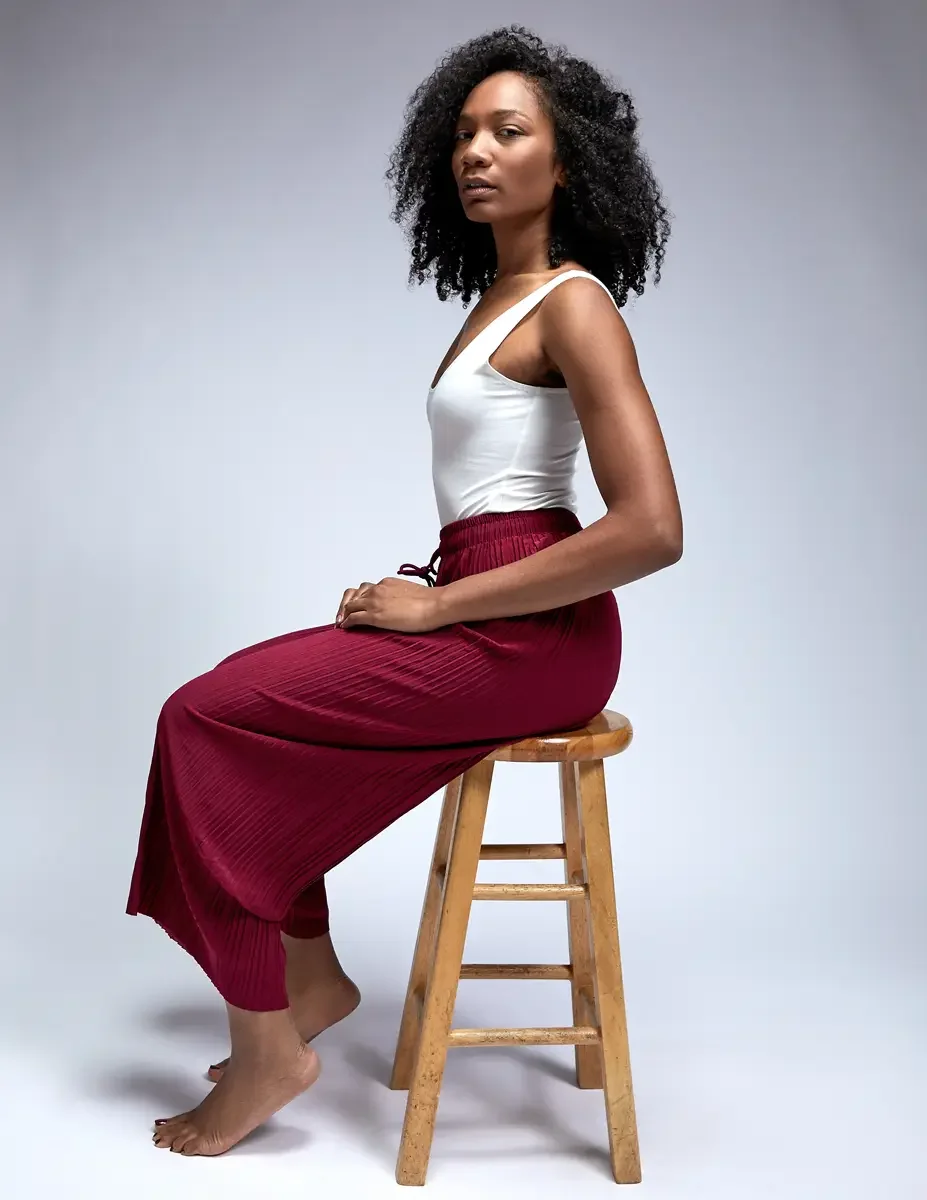 Arielle Chambers, black and white beauty portrait, direct gaze, white tank, East Williamsburg studio test shoot, makeup by Schanica Pickens, photographed by Scott Parker Photo