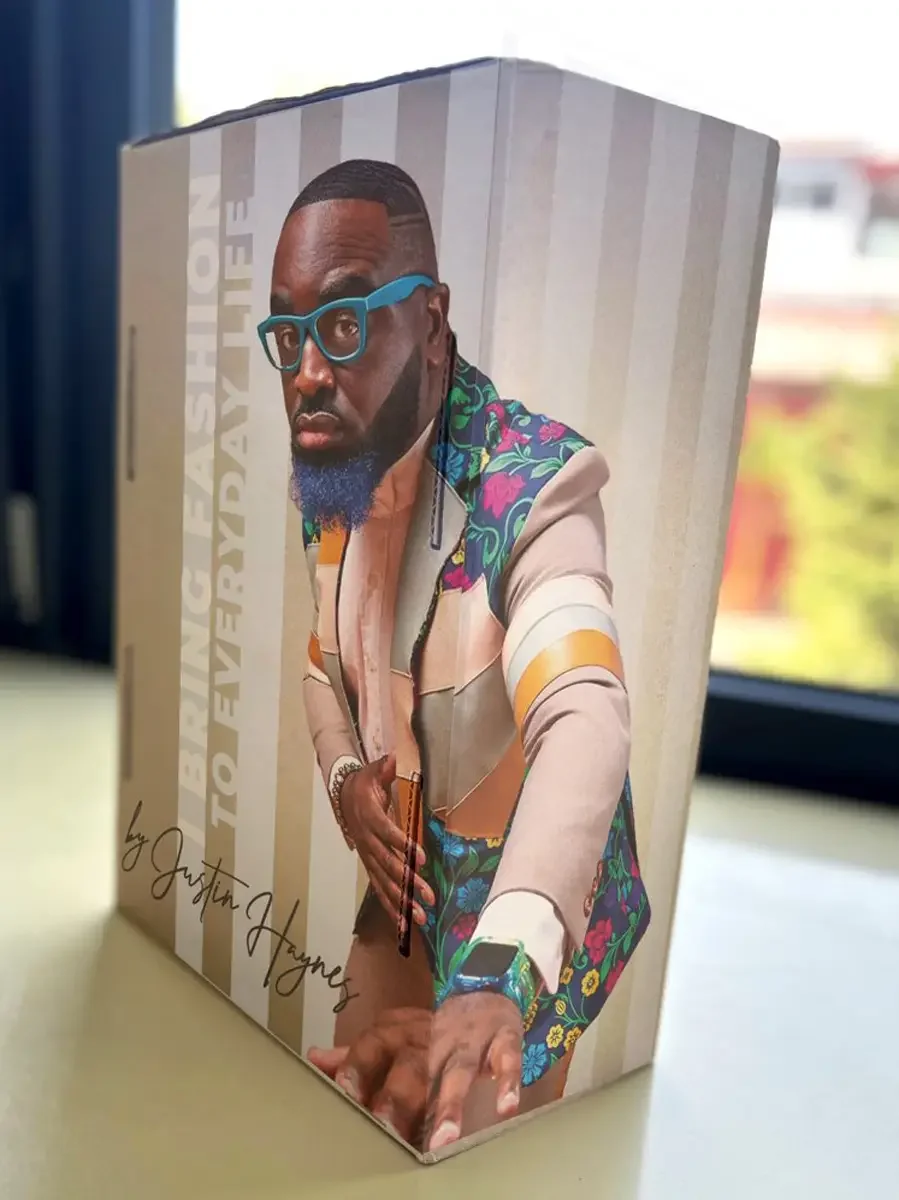 JUS10H 2024 Batz Sneakers campaign, product packaging with designer portrait, floral and stripe patchwork jacket, photographed by Scott Parker Photo