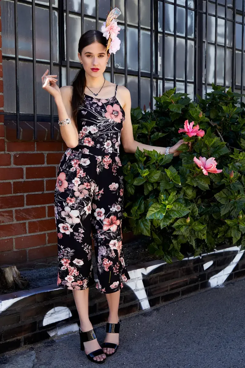 Victoria Henley, black floral jumpsuit and fan fascinator headpiece, hibiscus, iron gate, Los Angeles fashion week test shoot, photographed by Scott Parker Photo