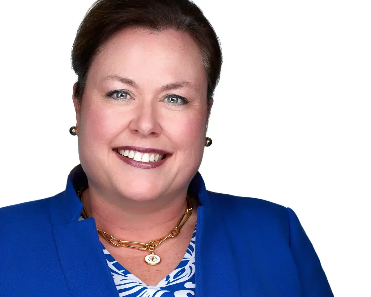 Healthcare professional headshot, navy knit top, genuine smile, approachable expression, white background, Connecticut, photographed by Scott Parker Photo