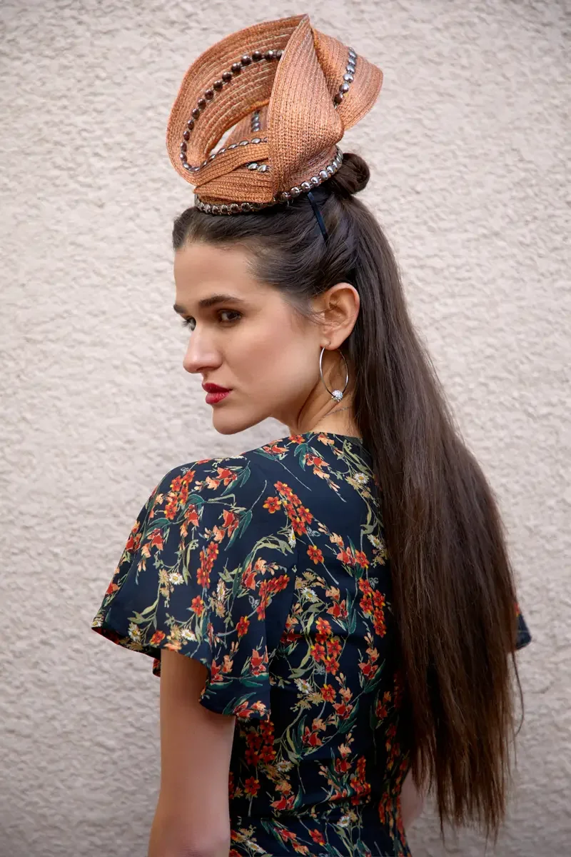 Victoria Henley, black floral maxi dress, copper sculptural fascinator, black sapphire pendant necklace, stucco wall, Los Angeles fashion week test shoot, photographed by Scott Parker Photo